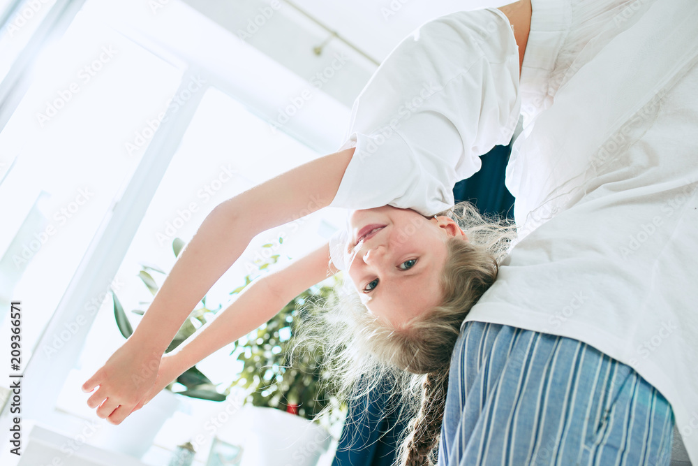 Fototapeta premium Father and his six years kid girl at home