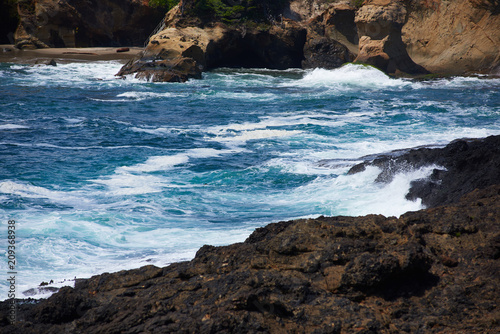 Waves roll ashore in Depoe Bay, Oregon photo