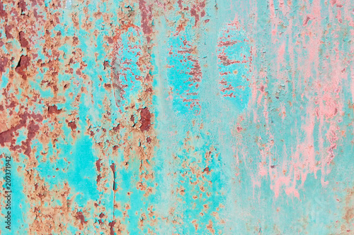 Texture turquoise rust pink streaks, the surface of the old fence corrosion