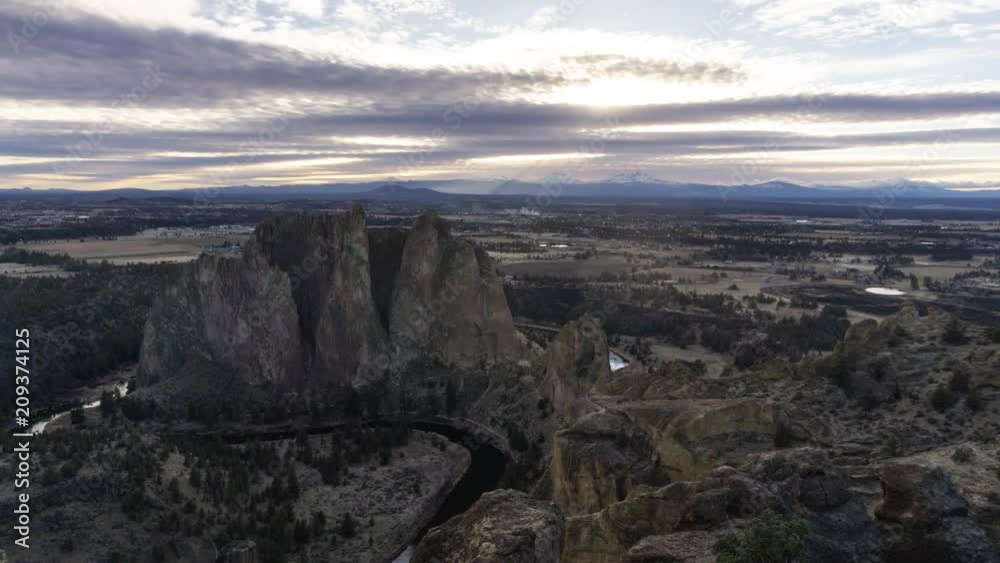 Striking time lapse of a cloudy sunset at a beautiful American Landscape. Taken in Smith Rock, Redmond, Oregon, United States.