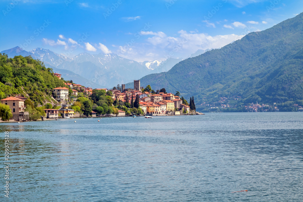 holidays in Italy - a view of the most  
beautiful lake in Italy, Varenna, Lago di Como. Famous city of Tremezzina in background