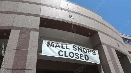 Closing announcement sign on retail mall in Washington DC area USA