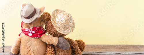 Friendship, teddy bear holding plush horse in its arms, banner photo