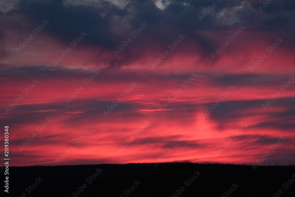 Beautiful sunset among the clouds. Russia. Background.
