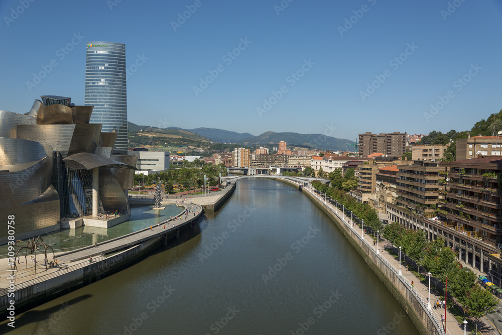 Ria del Nervion and Guggenheim Bilbao museum in sunny day