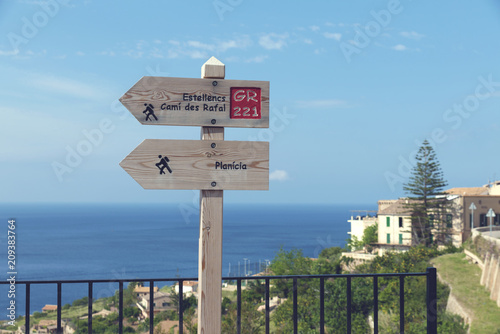 2018, 12 May, Spain.Wooden signs for touristic routes in Banyalbufar Majorca. Banyalbufar is a small coastal village in Serra de Tramuntana Mountains situated between Andratx and Valldemossa