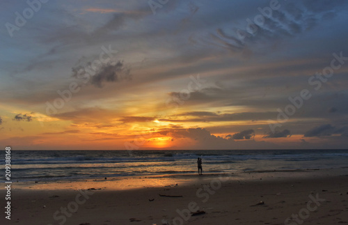 sunset at karon beach phuket thailand