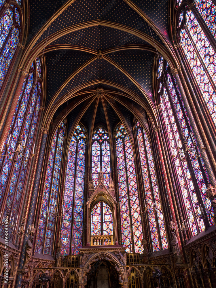 Rich decorated interior of the Gothic Medieval Sainte Chapelle - a royal chapel in Paris, France. June, 2018