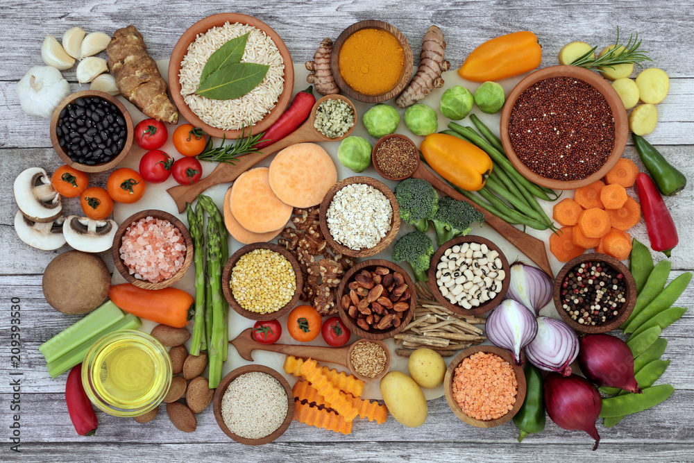 Health food for fitness concept with fruit, vegetables, pulses, herbs