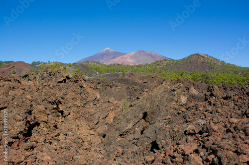 View of the Teide Volcano and Pico Viejo with lava flow on the foreground, Tenerife, Canary Islands