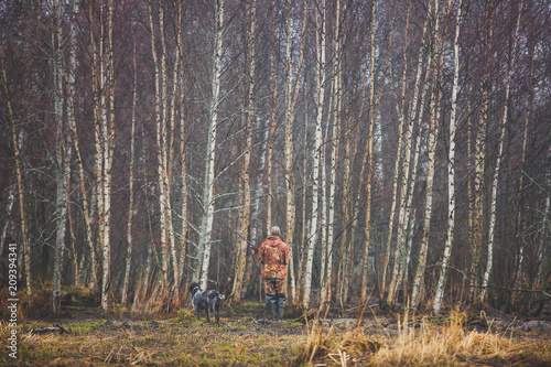 A process of hunting during hunting season, process of duck hunting, group of hunters and drathaar, german wirehaired pointer dog
 photo