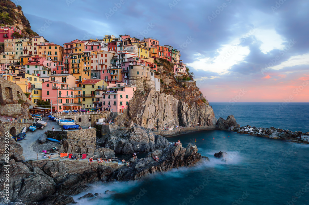 The colorful houses of Manarola during sunset in Cinque Terre, Liguria, Italy