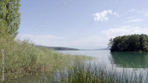 Still wide Still shot of Lake Hallwil, Aargau, Switzerland. Shot in daylight, few clouds. photo