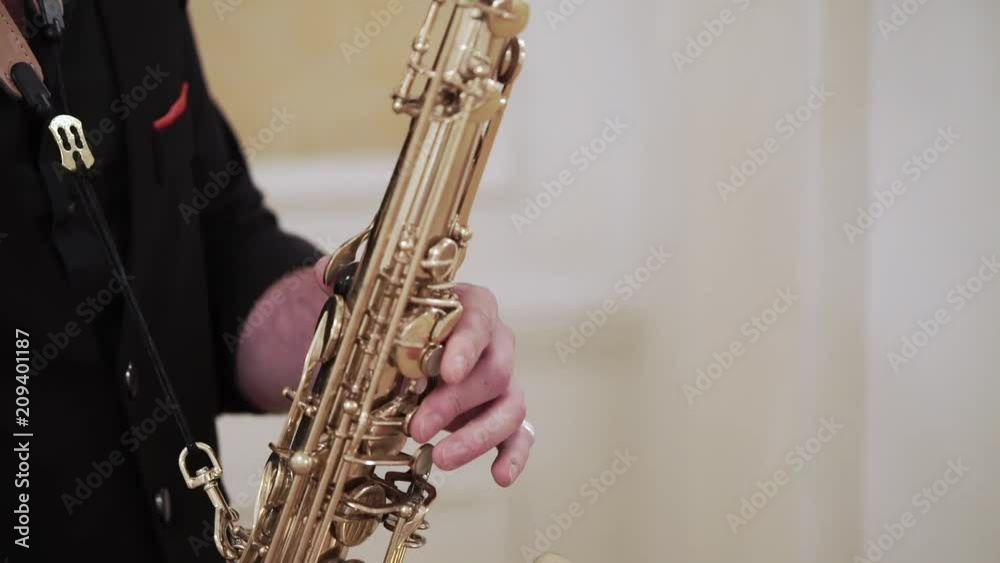 Saxophonist playing sax music at event Saxophonist playing sax music at event