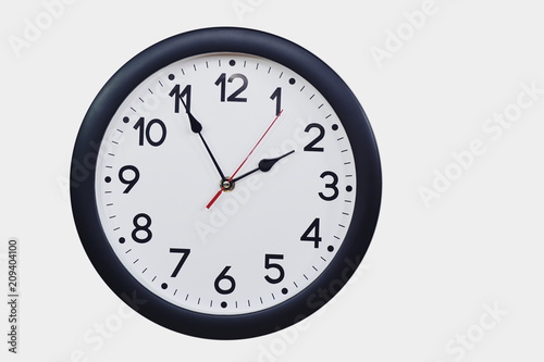 Time concept with black clock at five to two am or pm