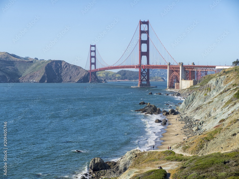 Golden Gate Bridge in San Francisco and Marshall's beach on a summer day Golden Gate Bridge in San Francisco and Marshall's beach on a summer day