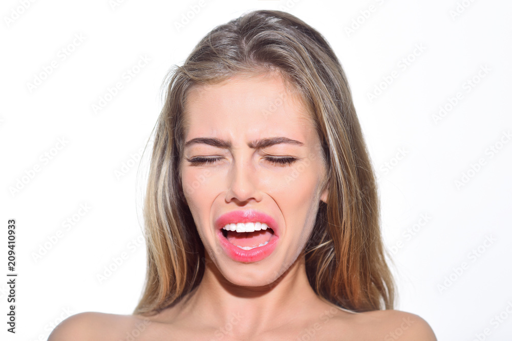 Portrait of crying girl isolated on white background. Feeling and emotions. Crying pretty girl. Face expression. Different emotions. Closeup portrait. Woman cry. Portrait of crying girl isolated on white background. Feeling and emotions. Crying pretty girl. Face expression. Different emotions. Closeup portrait. Woman cry.