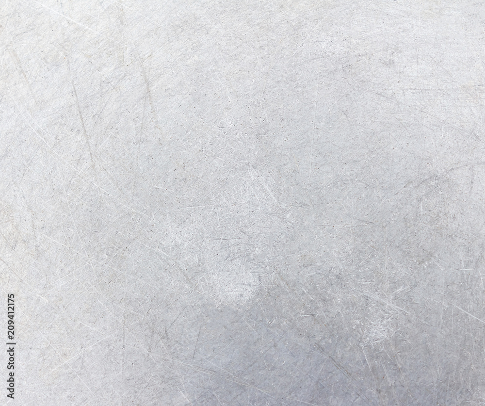 Grey grunge metal textured wall background