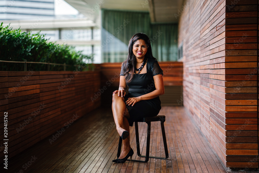 Corporate portrait head shot of a confident and attractive Indian Asian business woman. Corporate portrait head shot of a confident and attractive Indian Asian business woman.