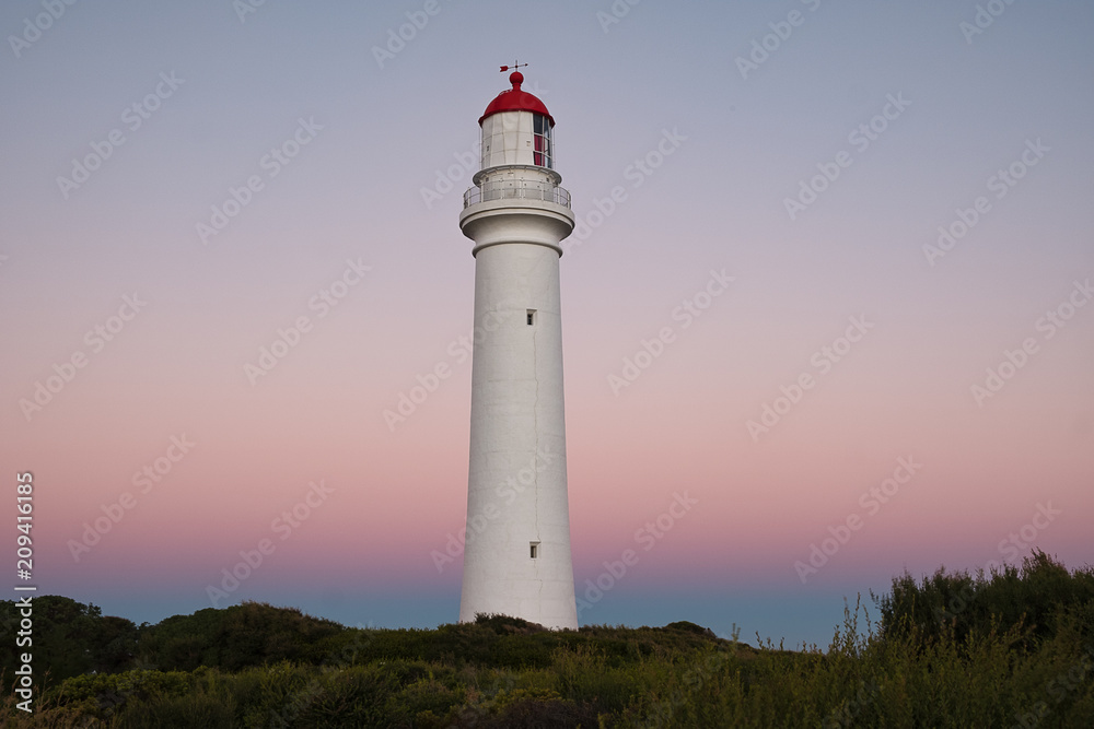 Split Point Lighthouse on the coastline of Australia, alongside the Great Ocean Road at sunset