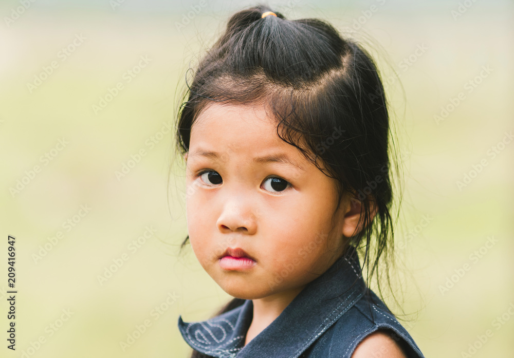 Portrait, standing, or the Asian girls, sad faces. Portrait, standing, or the Asian girls, sad faces.