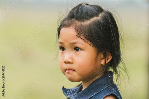 Portrait, standing, or the Asian girls, sad faces.