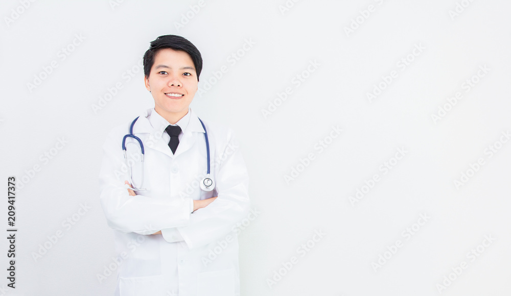 Soft focus and blurred. Homosexuality of asian doctor woman smiling look to camera with stethoscope on gray background. Soft focus and blurred. Homosexuality of asian doctor woman smiling look to camera with stethoscope on gray background.