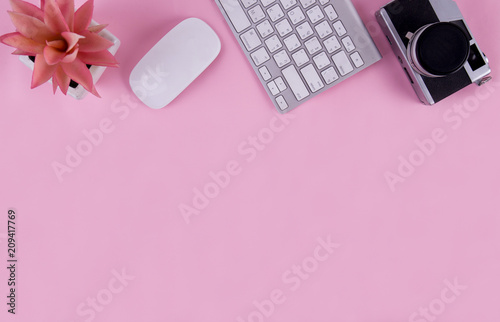 keyboard and retro camera and mouse on yellow background pastel tone