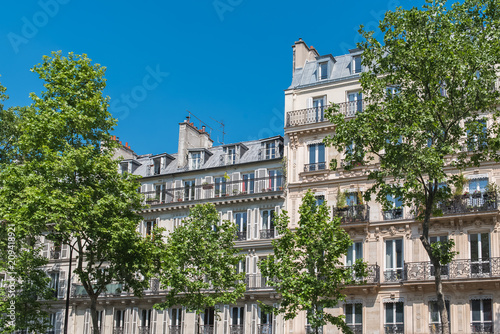 Paris, beautiful building, typical parisian facade in the Marais 