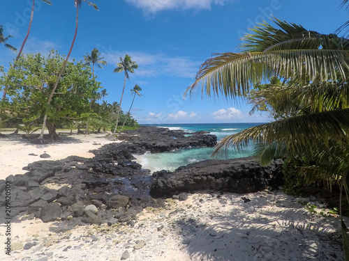 Beautiful beach with sand and rocks at Lefaga, Matautu, Upolu Island, Samoa, South Pacific photo