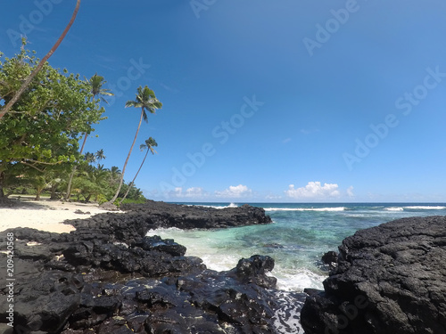 Unspoilt beach with sand and rocks at Lefaga, Matautu, Upolu Island, Samoa, South Pacific photo
