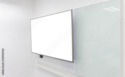 Mock up of LED TV installed to the white wall of the meeting room with white board