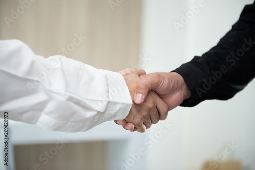 Business man hand shake for business deals