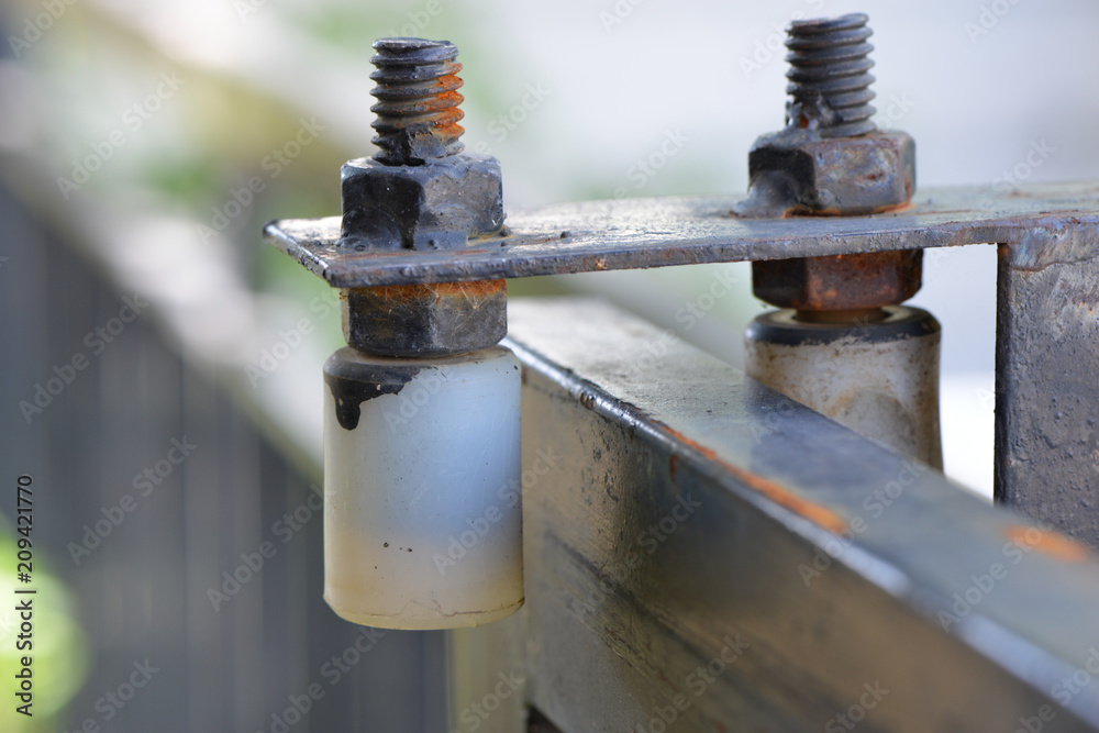 Metal guide and roller door support Metal guide and roller door support