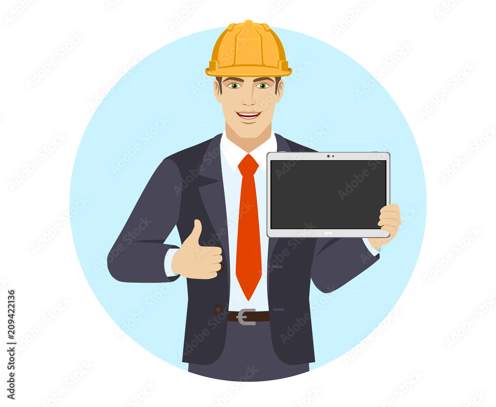 Businessman in construction helmet showing blank digital tablet PC and showing thumb Businessman in construction helmet showing blank digital tablet PC and showing thumb