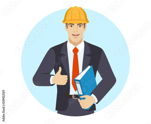 Businessman in construction helmet holding a folder and showing thumb