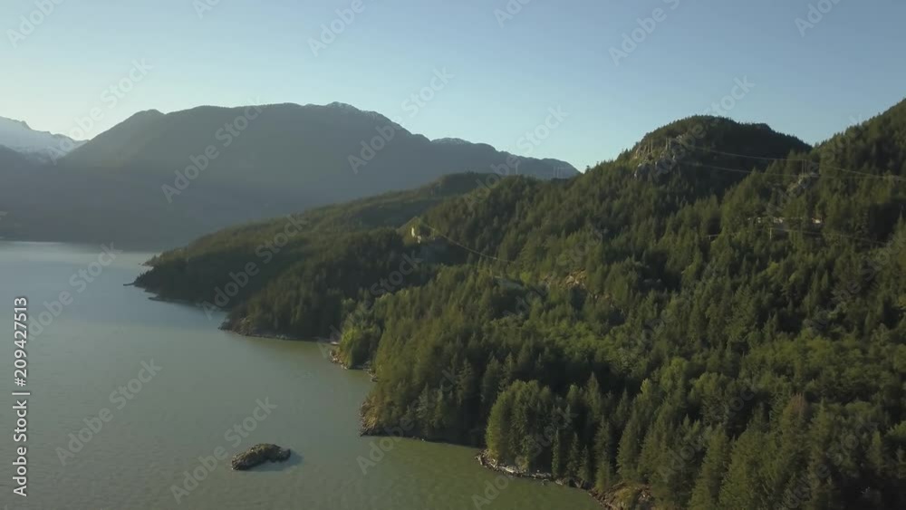 Aerial view of Britannia Beach during a vibrant sunny summer day. Located in Howe Sound near Squamish, North of Vancouver, BC, Canada. Aerial view of Britannia Beach during a vibrant sunny summer day. Located in Howe Sound near Squamish, North of Vancouver, BC, Canada.