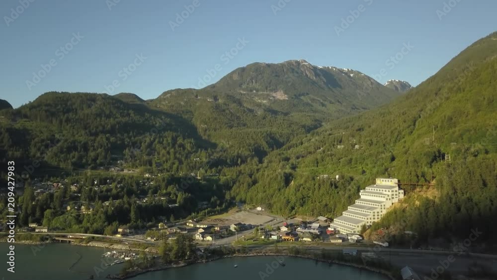 Aerial view of Britannia Beach during a vibrant sunny summer day. Located in Howe Sound near Squamish, North of Vancouver, BC, Canada. Aerial view of Britannia Beach during a vibrant sunny summer day. Located in Howe Sound near Squamish, North of Vancouver, BC, Canada.
