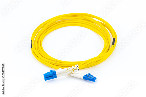 Fiber optics single mode patch cord LC to LC connector, isolated on white background