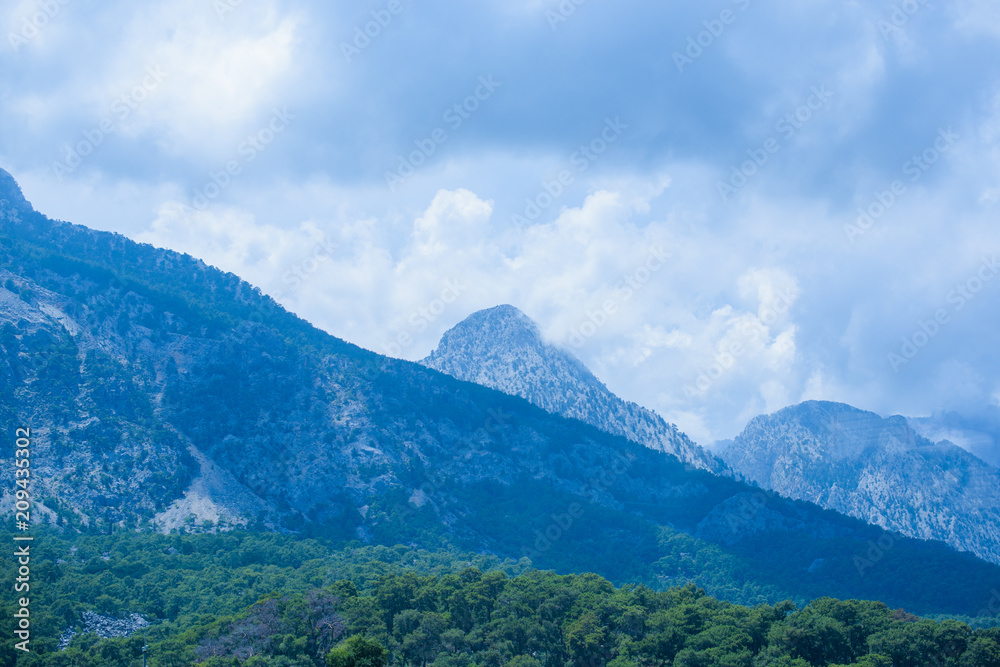 Mountains at nice sunny day. Beautiful natural landscape in the summer time. Idyllic summer landscape with clear mountain 