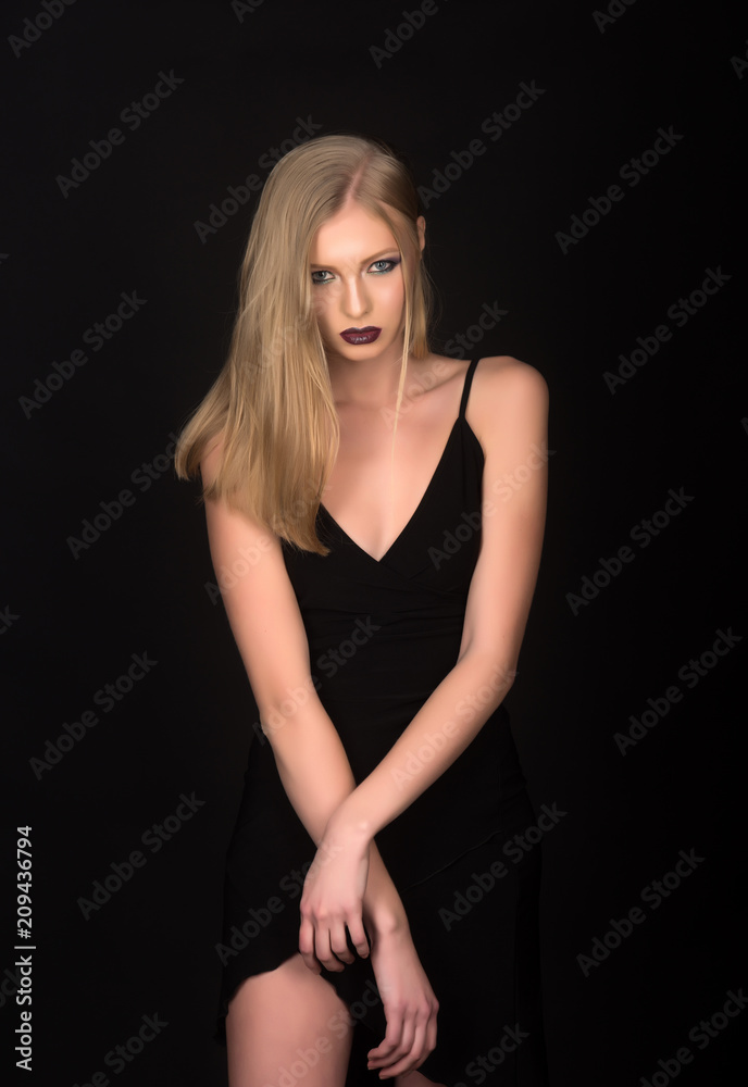 Elegant style of sensual girl. Sexy woman with blonde hair isolated on black.  Hairdresser and beauty salon. Fashion model with makeup and stylish hairdo.  Girl with pigtail blond hair. Stock Photo