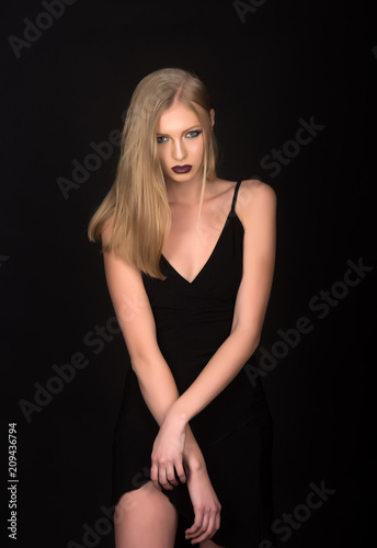 Elegant style of sensual girl. Sexy woman with blonde hair isolated on black. Hairdresser and beauty salon. Fashion model with makeup and stylish hairdo. Girl with pigtail blond hair.