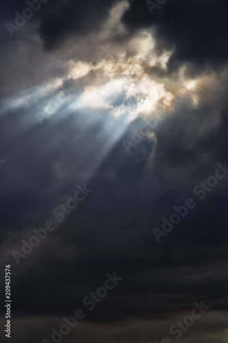 in the cloudy sky a ray of light l