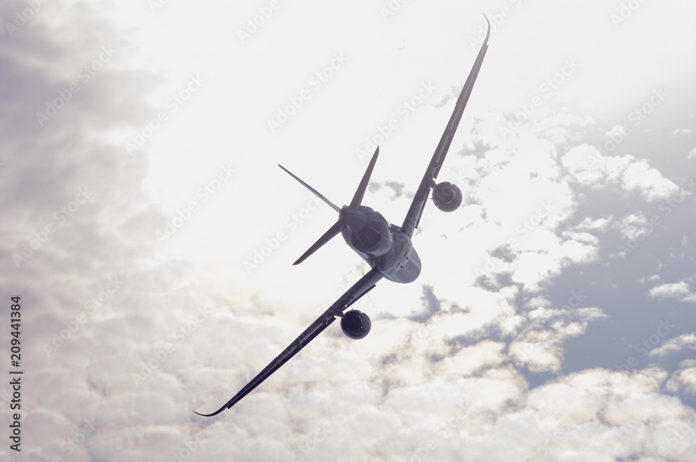 Airliner in cloudy sky Airliner in cloudy sky