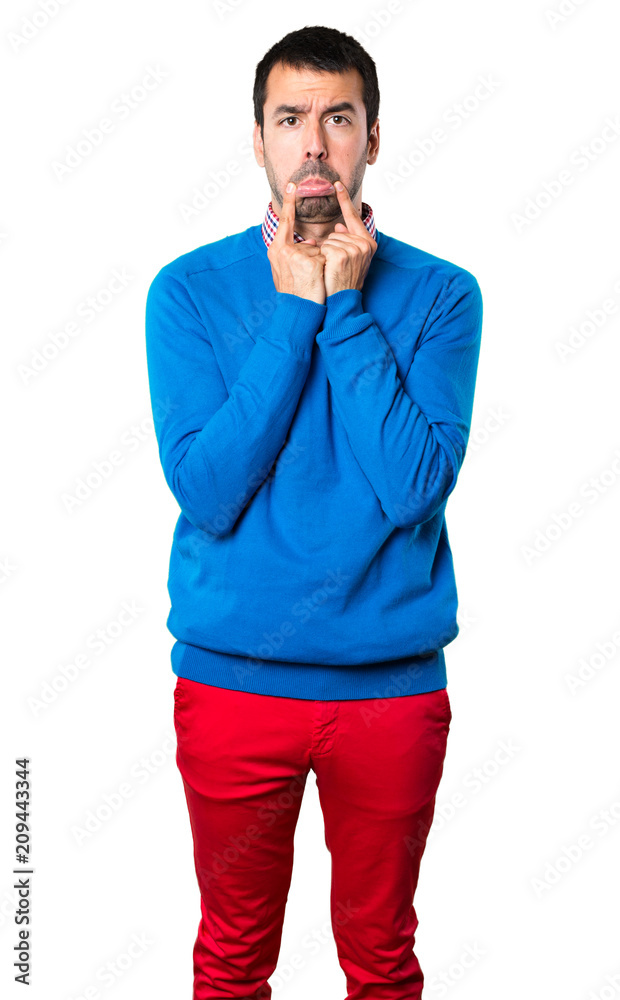 Sad handsome young man on white background