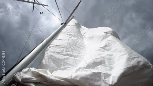 Sail on sailing yacht at windy sunny day