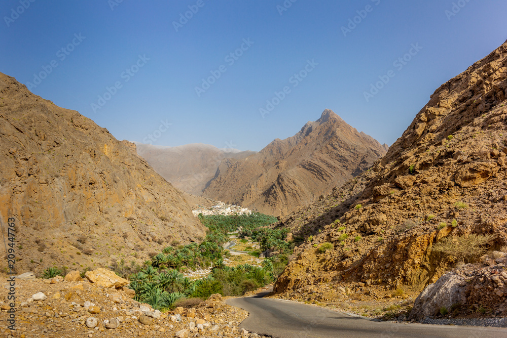 A remote village with its oasis and palm dates plantation in Oman - 3