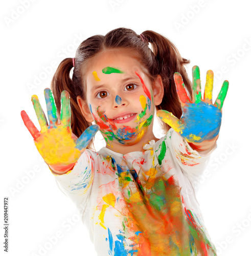 Funny girl with hands and face full of paint