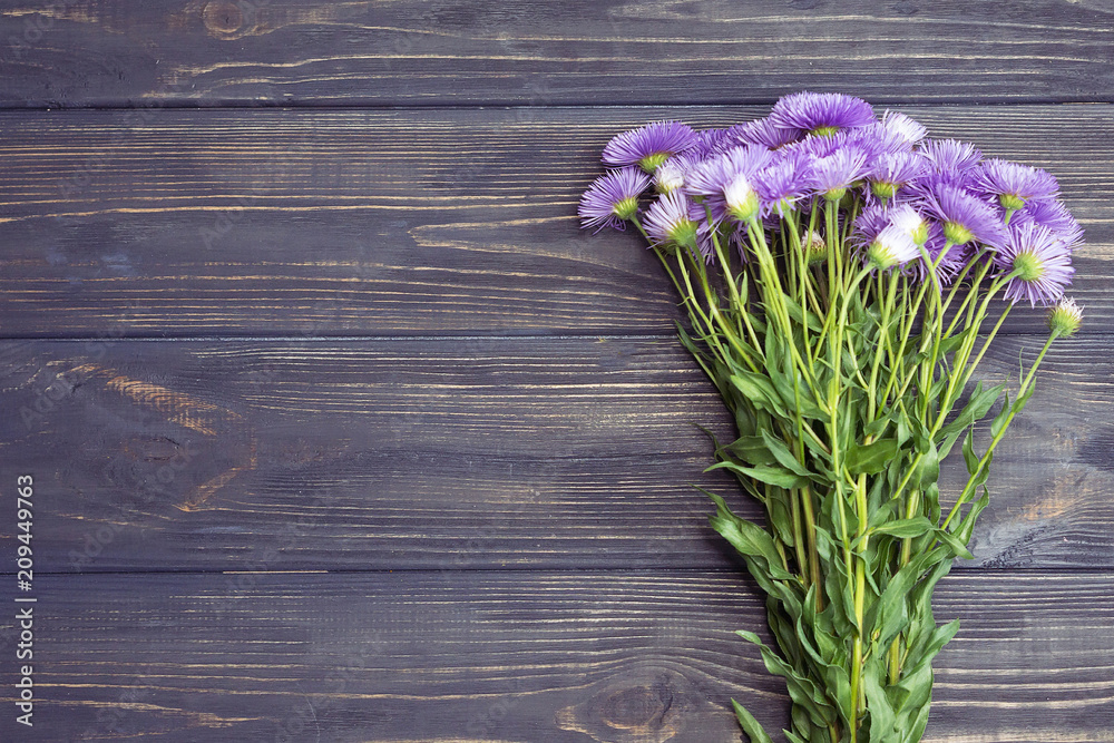bouquet of summer flowers on a wooden background bouquet of summer flowers on a wooden background