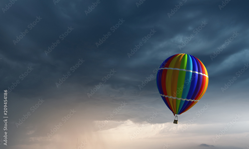 Fototapeta premium Air balloon in sky. Mixed media
